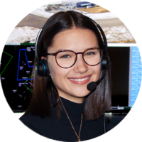 Portrait of young dark haired apprentice at ARSO wearing a headset at work.