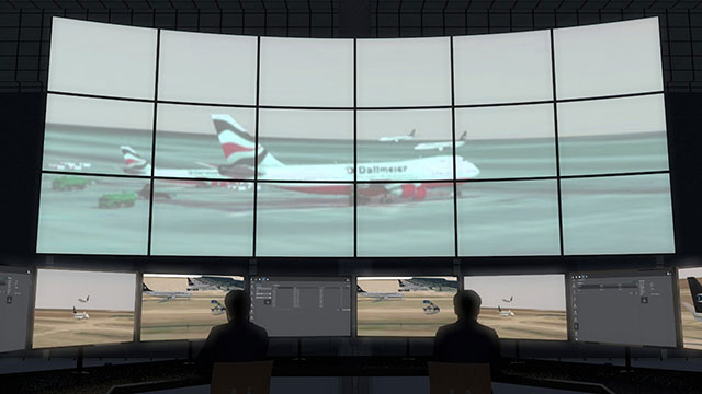 Monitor de videovigilancia de pared del aeropuerto